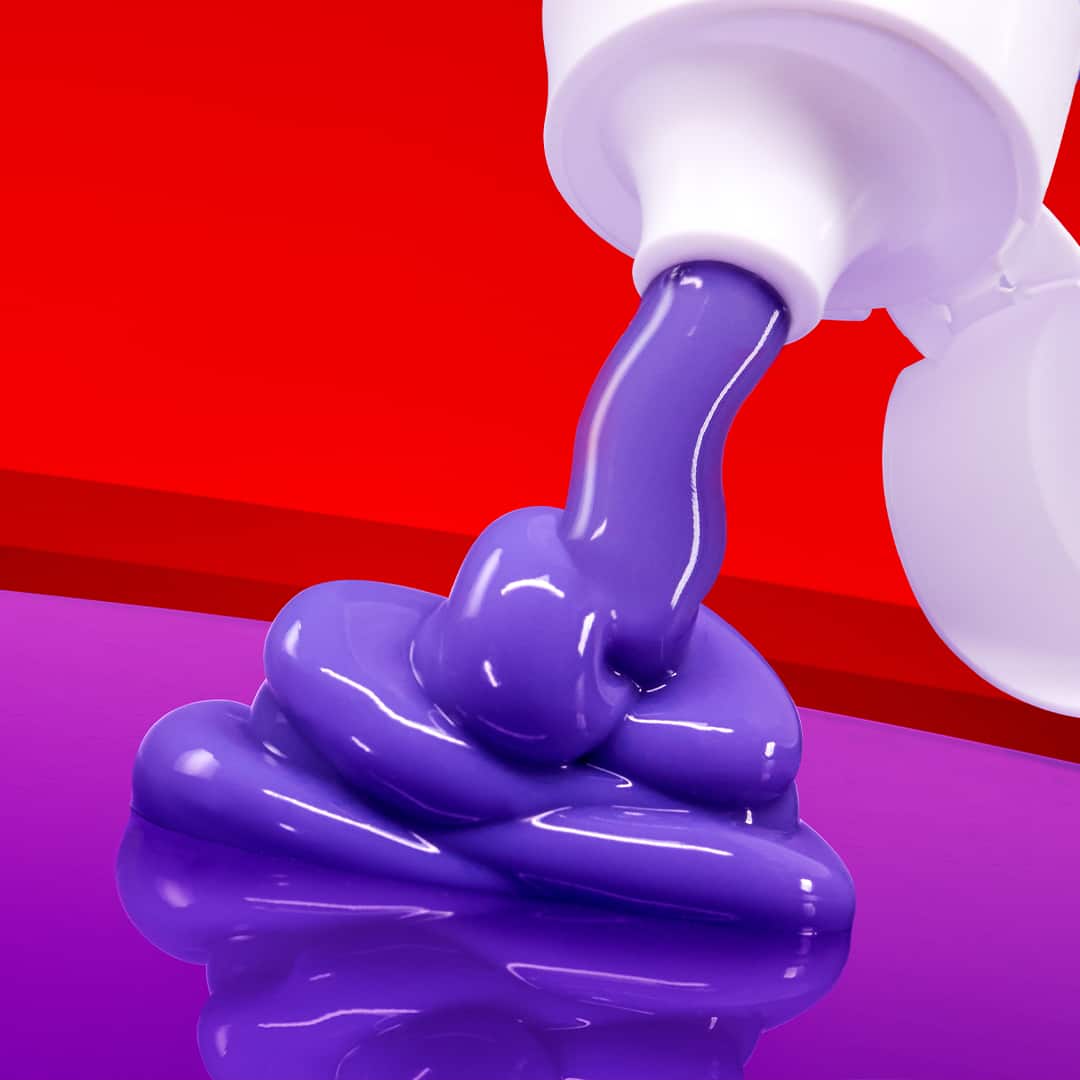 Colgate Optic White Purple Whitening Toothpaste with the power of purple brighteners squirting out into a red background